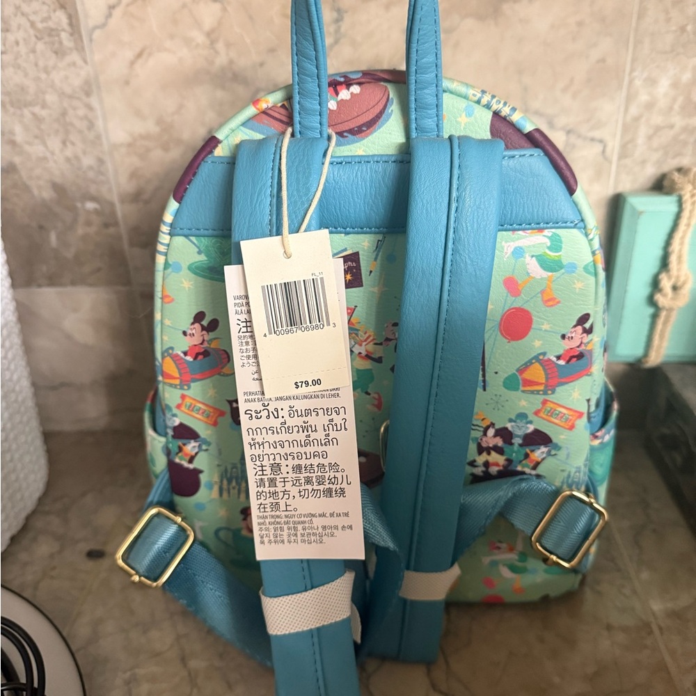Loungefly Disney Parks Kids Backpack - Teal and Multicolor - Picture 2 of 2